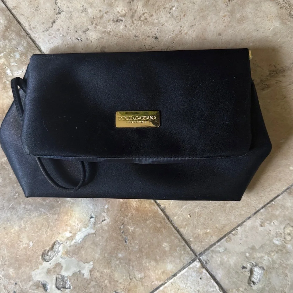DOLCE and GABBANA PARFUMS ladies Black wristlet excellent condition silky feel